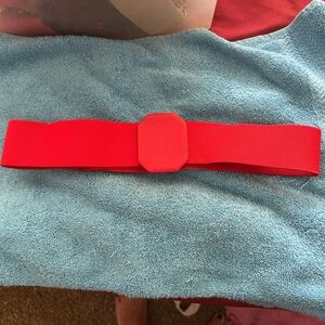 Women’s Vintage Fashion Belt. Beautiful red color. Unique shape buckle. Stretchy